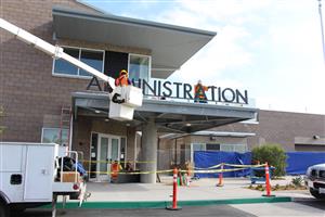 Front Entrance Sign with ADMINISTRATION letters in place 