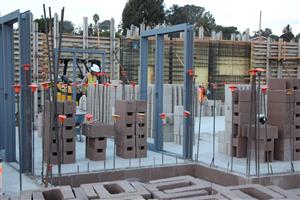 Masonry progress on classroom building 