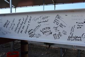 Steel beam with signatures 